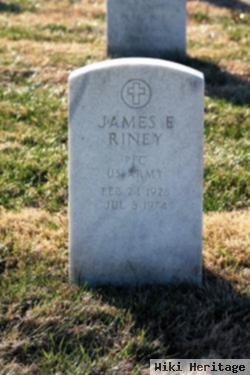 James E Riney