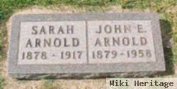 John E Arnold