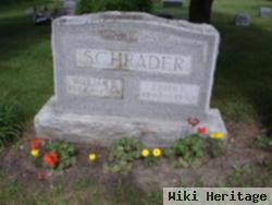 William E. Schrader