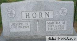 Martha M Horn