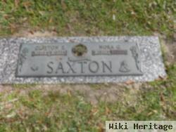 Clayton E Saxton
