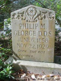 Dr Philip M George