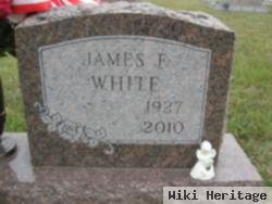 James F White