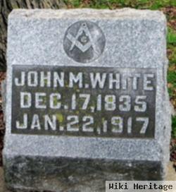 John M. White