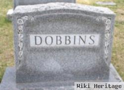 Lester E Dobbins