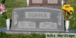 John E. Topper