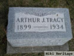 Arthur J Tracy