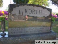 Roger M Korth