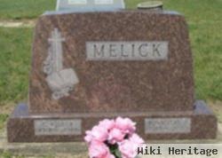 C. Wilbur Melick