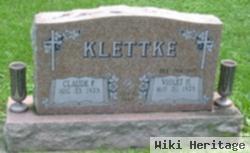 Claude F Klettke