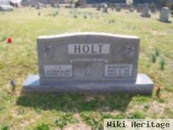 L D Holt