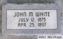 John M. White