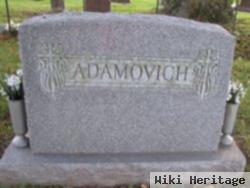 Nick E. Adamovich