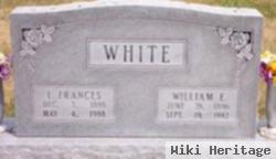 William E. White