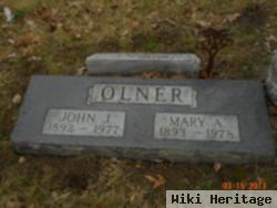 John J Olner