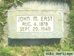 John M. East