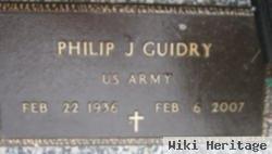 Philip J Guidry