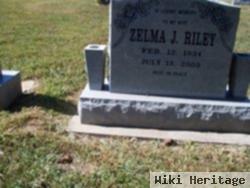 Zelma J Riley