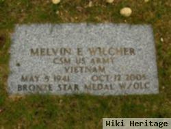 Melvin E Wilcher