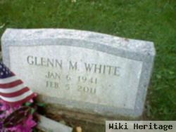 Glenn M White