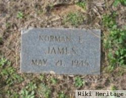 Norman E James