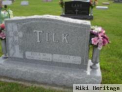 John C Tilk