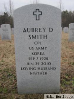 Aubrey D Smith