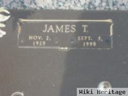 James T Holmes