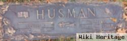 Louis F Husman