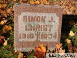 Simon J Christ