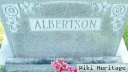 Roy E Albertson