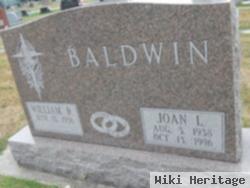 Joan L Baldwin