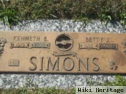 Kenneth E Simons