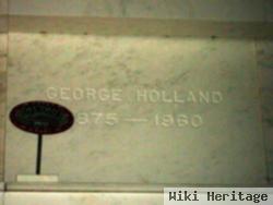 George E Holland