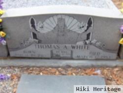 Thomas A. White