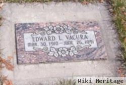 Edward L Vacura