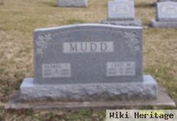 Alfred T Mudd