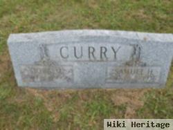 Dora M Curry