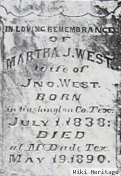 Martha J West