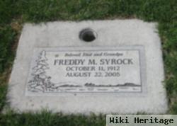 Freddy M Syrock