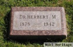 Dr Herbert M. Maynard