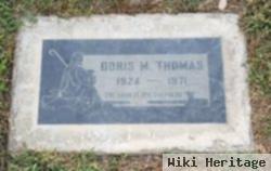 Doris M. Thomas