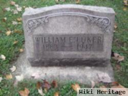 William E Luker