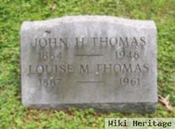 Louise M Thomas