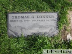 Thomas G Lokker