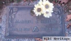 Margery E Hollin