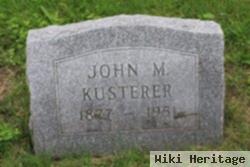 John M Kusterer