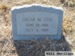 Oscar M Cox