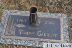 Thomas E. "tommy" Garrett