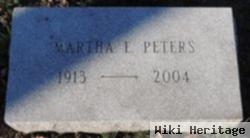 Martha E Peters